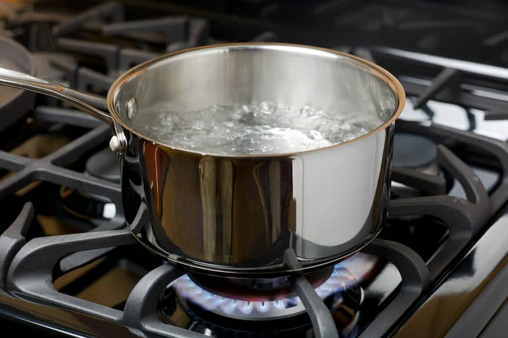 How to boil water on the stove by pot