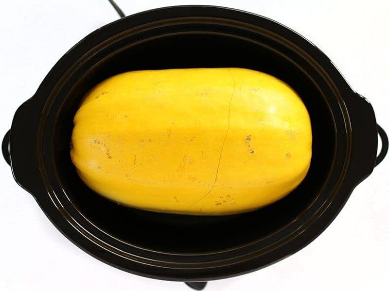 Uncooked Spaghetti Squash in a slow cooker
