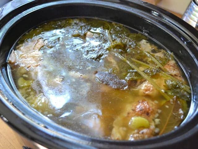 Top view of Slow Cooked Chicken Broth in slow cooker 