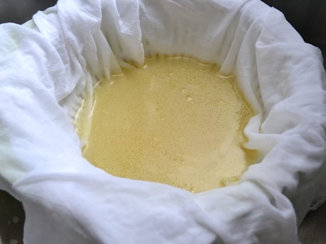 straining broth a second time through cloth 