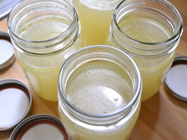 Top view of finished broth in mason jars 