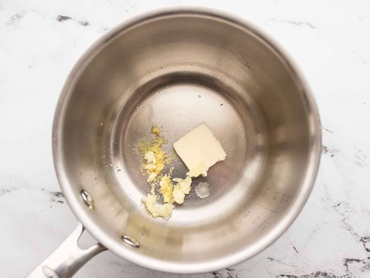 Butter, garlic, and ginger in a pot