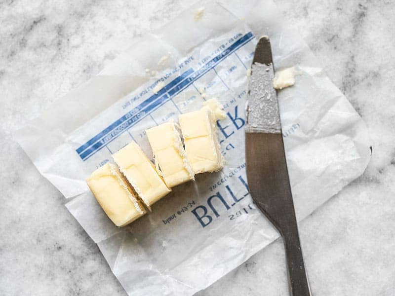 Slice Butter into 1 Tbsp pieces