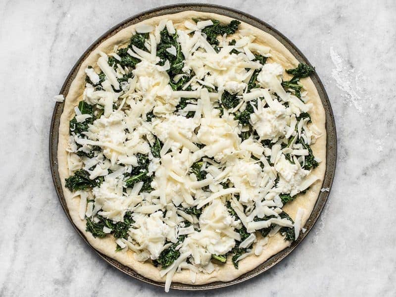 Topped Garlicky Kale and Ricotta Pizza