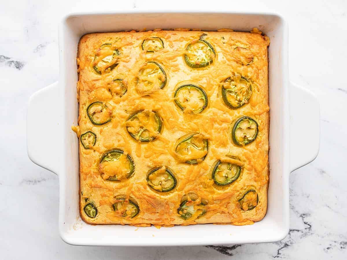 baked jalapeño cheddar cornbread in the baking dish