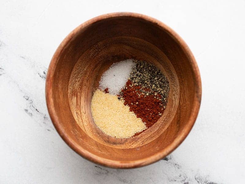 seasoning for bbq chicken in a small wooden bowl