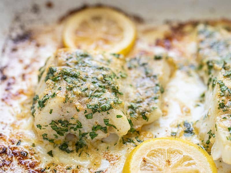 Close up view of the baked Cod in the baking dish.