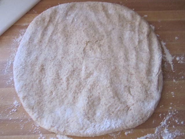 dough pressed out on counter 