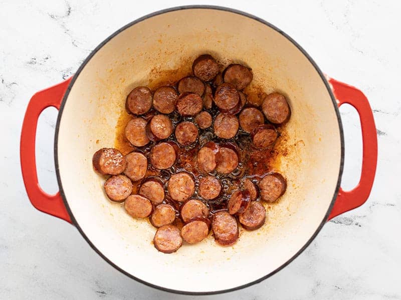 Browned sausage in pot