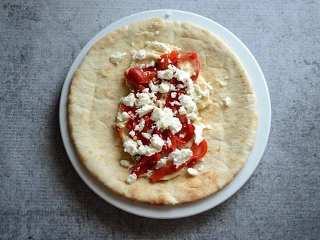 Red Peppers and Feta added on top of hummus