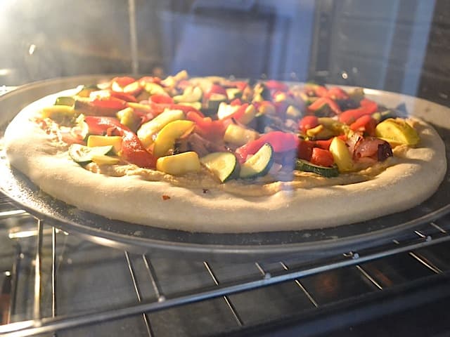 hummus pizza in oven 