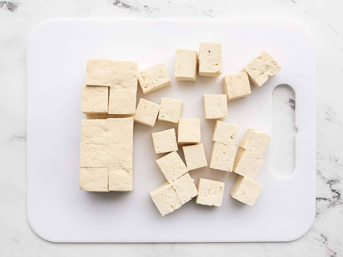 Cubed tofu on a cutting board