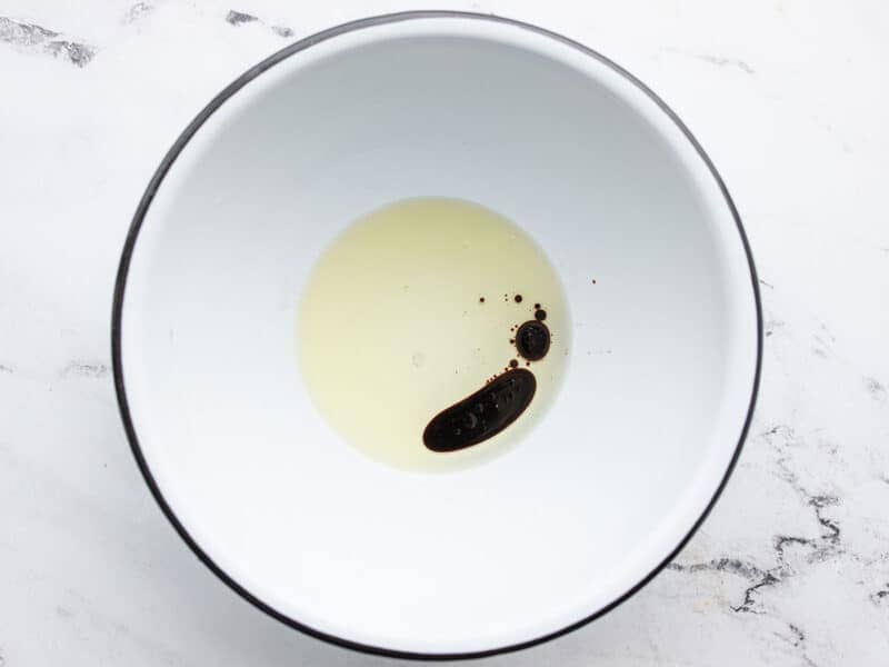 cooking oil and soy sauce in a large bowl
