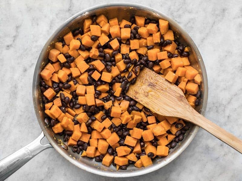 Add Black Beans to sweet potatoes and Season
