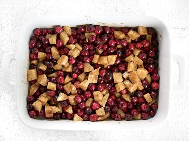 Cranberries and apples tossed in Brown Sugar and Spices in the casserole dish