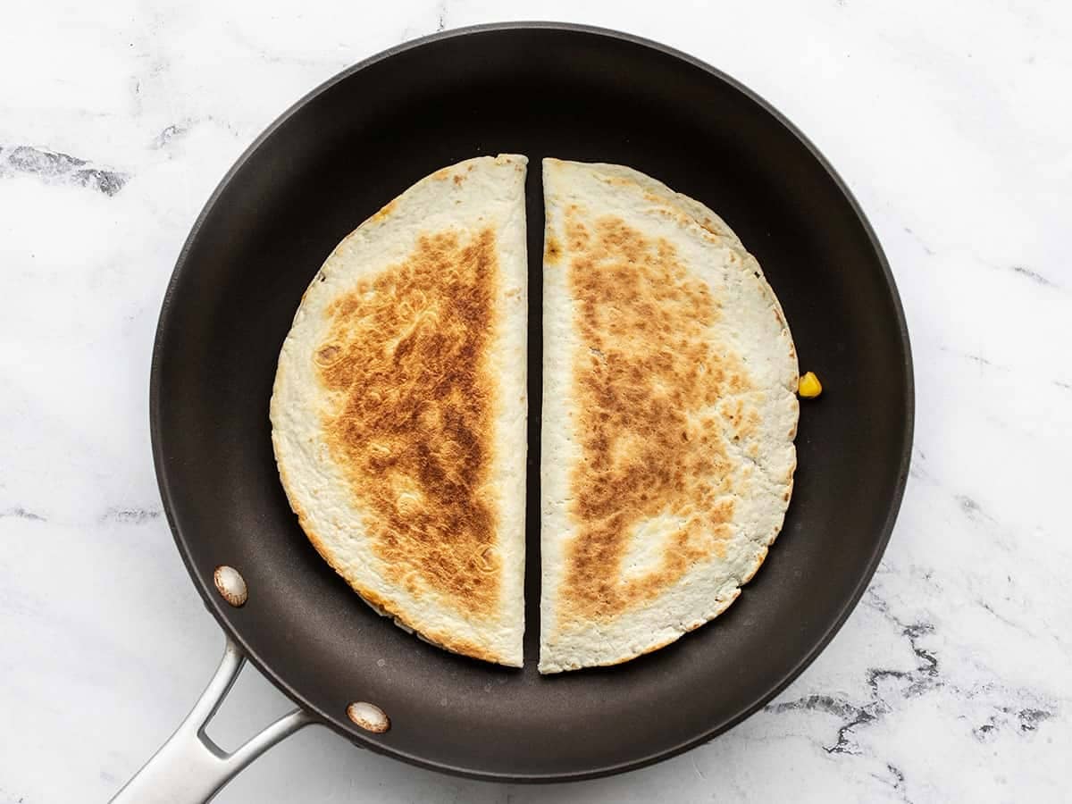 quesadillas cooking in a skillet