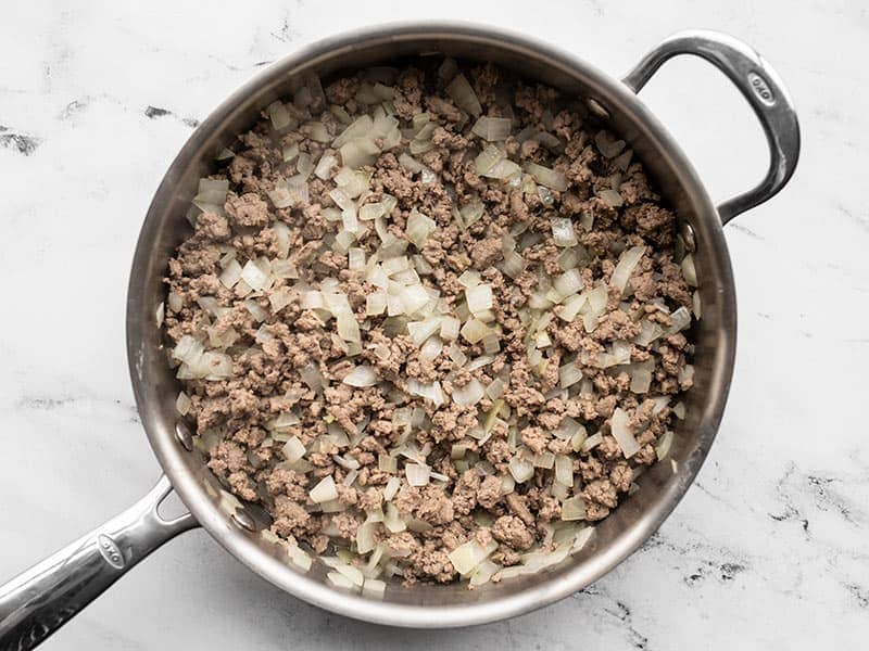 Cooked ground turkey and onions in the skillet