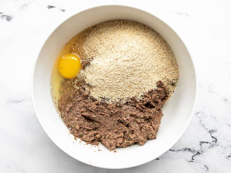 Black bean mixture with egg and breadcrumbs