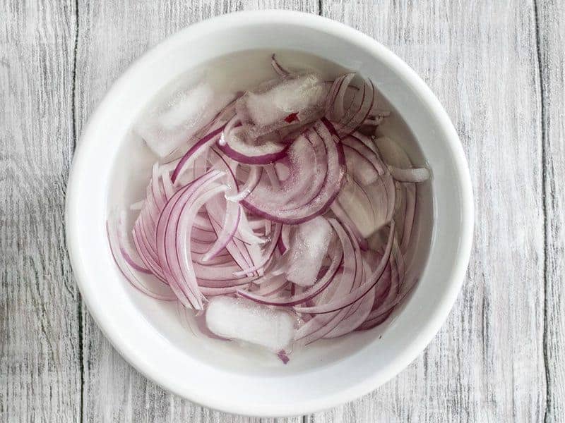 Soak Red Onions in ice bath