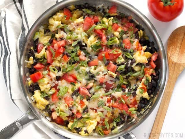 Ultimate Southwest Scrambled Eggs make a fast and filling dinner or brunch, and are a great way to use up leftover ingredients in the kitchen. BudgetBytes.com