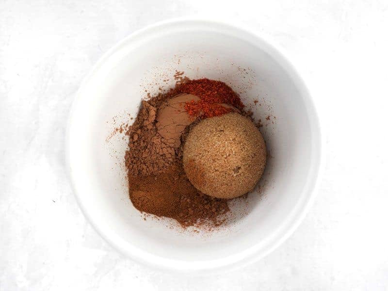 Aztec Cocoa Spices in a small white bowl