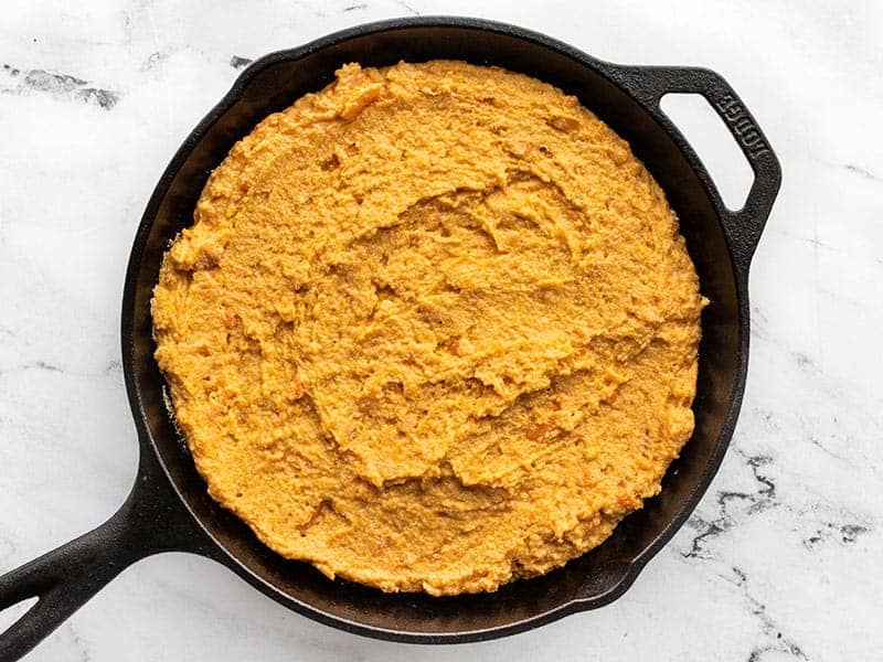 cornbread batter in the hot skillet